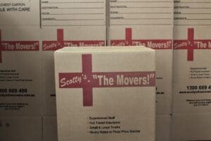 A Cardboard box Used for Packaging with Scotty's the Movers Branding