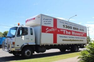 Side View of Moving truck used by Scotty's the movers with branding
